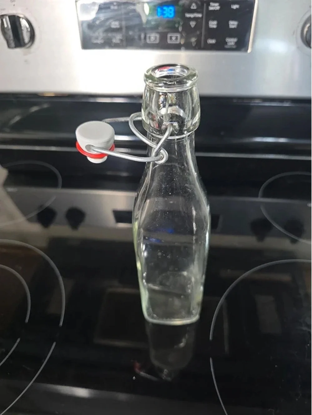 Clear Glass Bottle with Swing-Top Cap